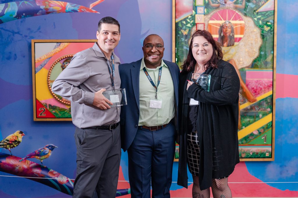 Josh, Ricky, and Heaven posing for the do the right thing award